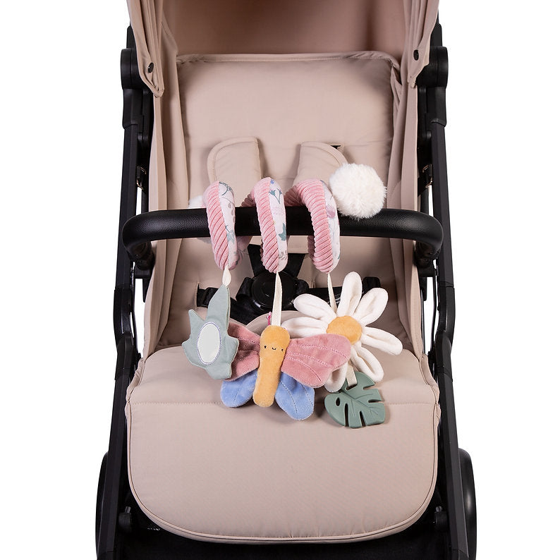 Red Kite Spiraloo Rose  Ivy with colorful flowers attached to a baby stroller seat.
