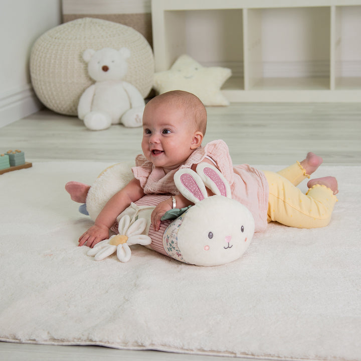 Red Kite Tummy Time Roller Rose & Ivy with baby lying on it