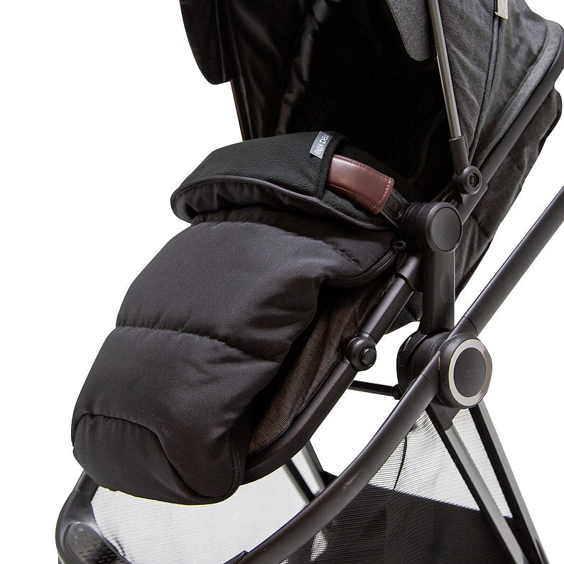 Red Kite Universal Black footmuff attached to a stroller on a white background