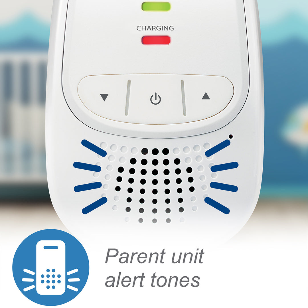 White electronic device with buttons and indicator lights, labeled 'Parent unit alert tones', on a blurred background.
