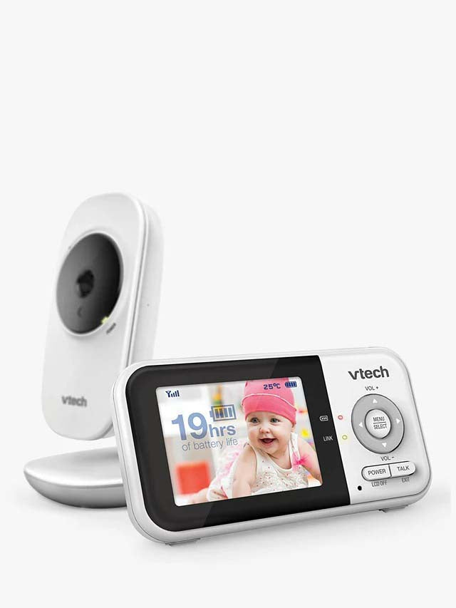Vtech baby monitor with screen displaying a baby and battery life information on a white background