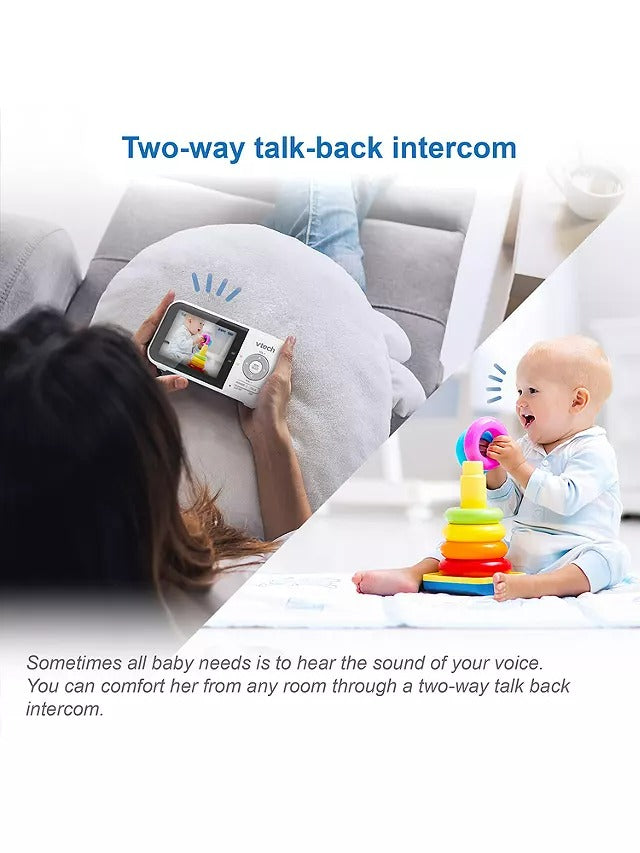 Baby monitor with two-way talk-back intercom in a bedroom setting.