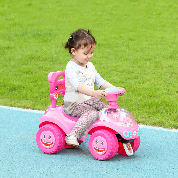 AIYAPLAY Foot to Floor oddler Ride on Toy w/ Music, Light, Horn, Under Seat Storage, Anti-Over-Backwards Device, Pink