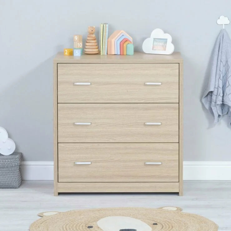 Wooden dresser with toys and decor in a child's room
